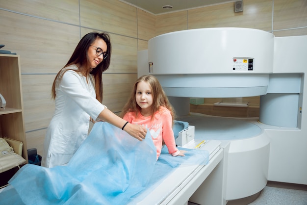 Medical equipment. Doctor and patient in MRI room