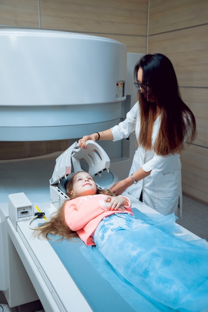 Medical equipment. Doctor and patient in MRI room