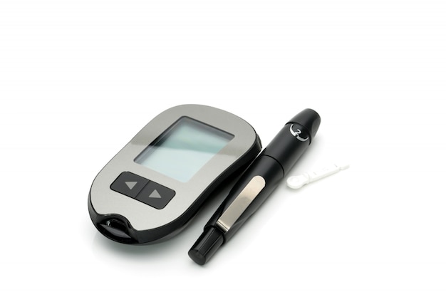 Medical equipment for measuring the level of blood glucose with lancing pen device on white background with copy space