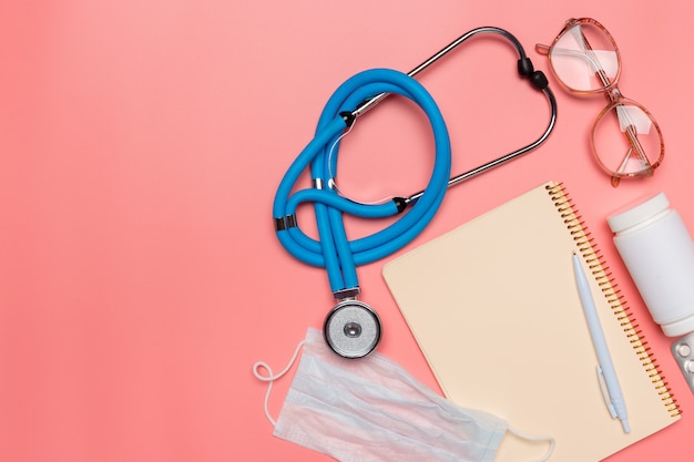 Medical equipment on a pink pastel