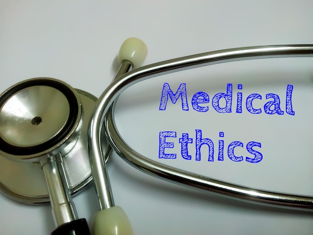 Medical Ethics text on white background with stethoscope