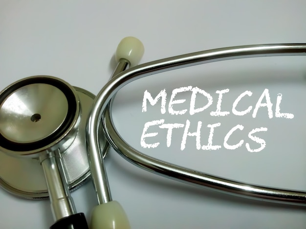 Medical Ethics text on white background with stethoscope