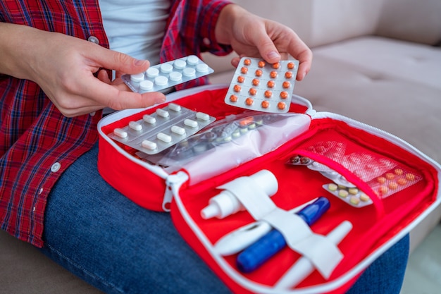 Medical first aid kit with medicine and pills for pain and illness