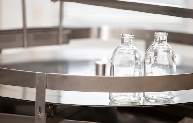 Medical glass bottles in a laboratory metal container