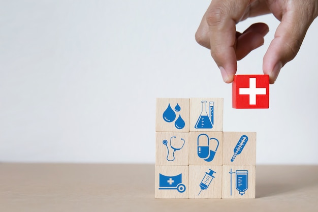 Medical and health graphics Icons on wooden blocks.