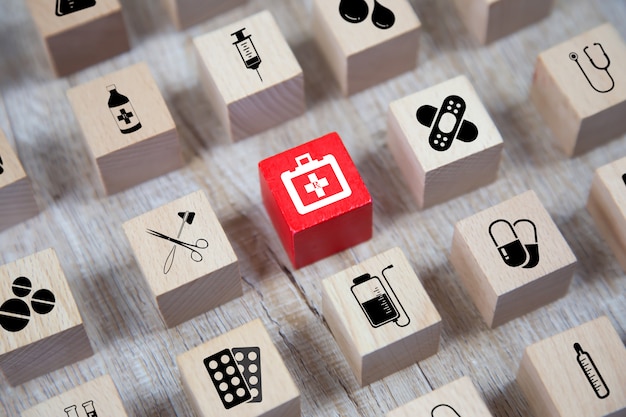 Photo medical and health icons on wooden blocks.