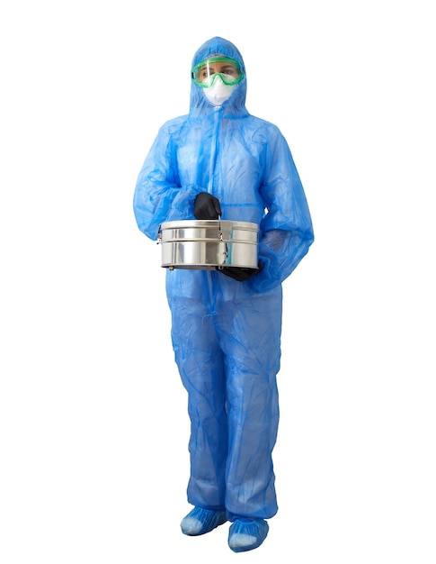 Medical healthcare technologist holding holding autoclave sterilizer metal box wearing ppe