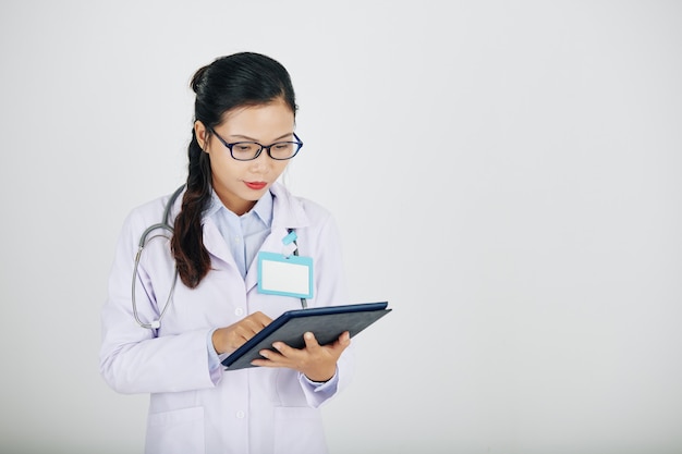 Medical intern with tablet computer