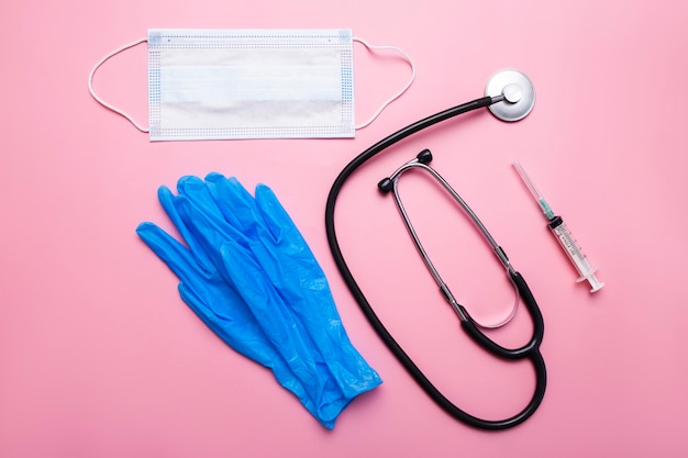 Medical mask, blue gloves, stethoscope