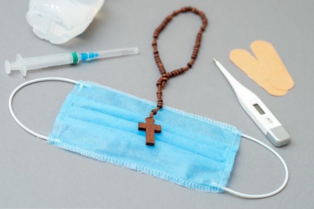 Medical mask with catholic cross.