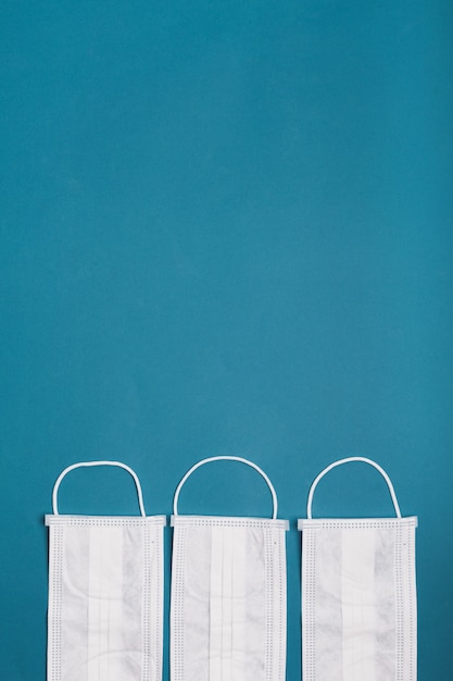 Medical masks on a blue background