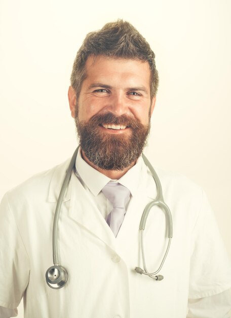 Medical medicine treatment healthcare and ambulance services concept cheerful bearded male physician