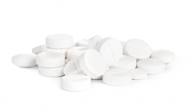 Medical pill tablet on white surface