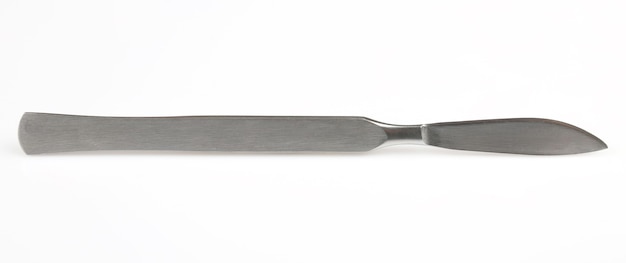 Medical scalpel on a white background. everyday items