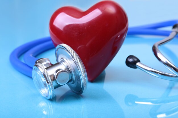 Medical stethoscope and red heart isolated 