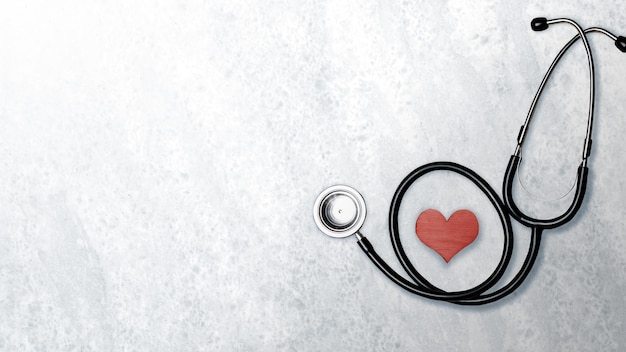 Medical stethoscope and red heart