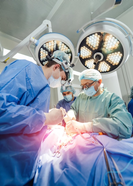 Medical surgery process in modern hospital room Neurosurgeon specialists operating