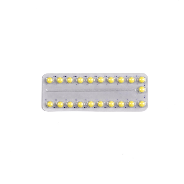 Medical tablets contraceptive pills isolated on white surface