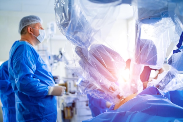 Medical team performing operation Group of surgeon at work in operating theatre