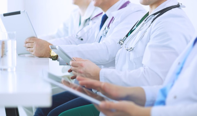 Medical team sitting and discussing at table