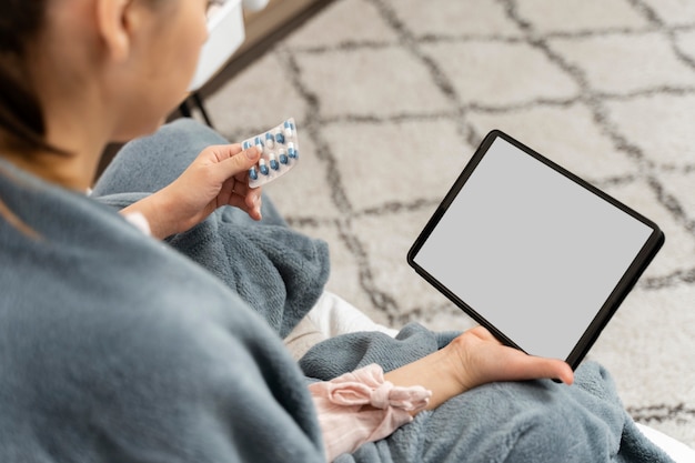 Photo medical teleconsultation for sick patient at home