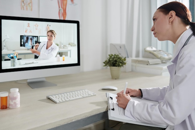 Medical Worker Attending Online Class