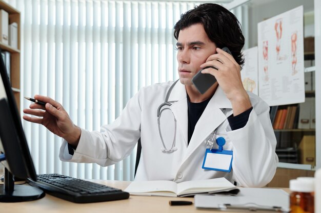 Medical Worker Calling Colleague