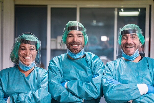 Medical workers inside hospital corridor during coronavirus pandemic outbreak ,Doctor and nurse at work on Covid-19 crisis period