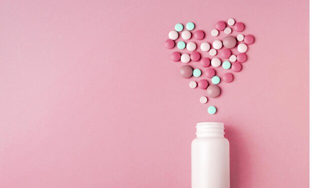 Medication pills bottle on background