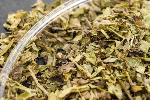 Photo medicinal milk thistle dried leaves alternative herb medicine ingredient macro