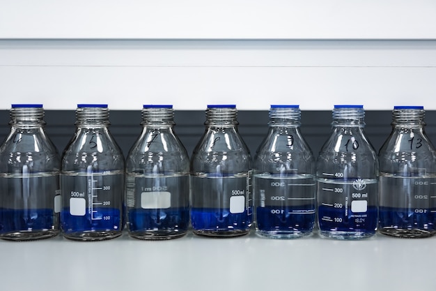 Medicine bottles with vaccine in laboratory