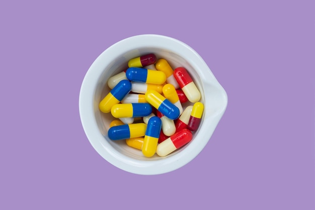 Medicine concept with colored capsules