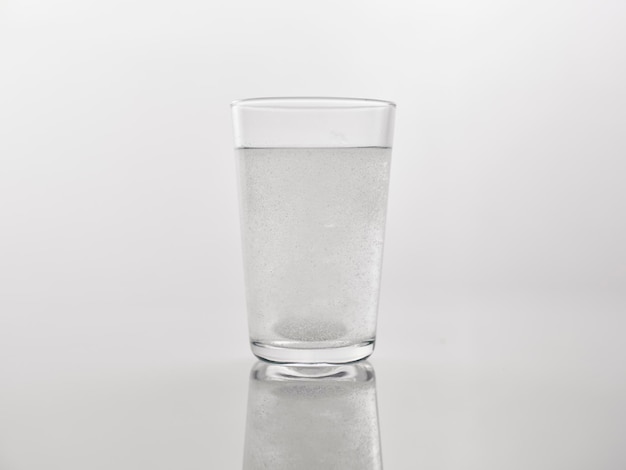 A medicine dissolved in a glass of water