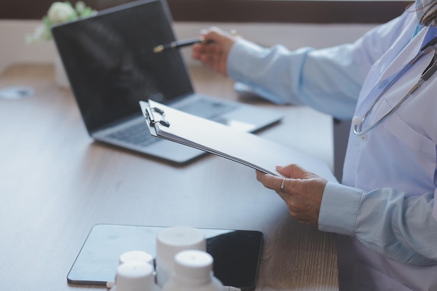 Medicine doctor touching tablet Medical technology and futuristic concept