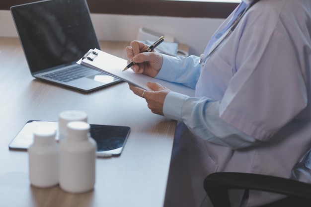 Medicine doctor touching tablet Medical technology and futuristic concept