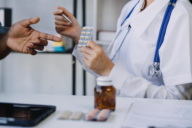 Medicine doctor working with digital medical interface icons on the hospital background Medical technology and network concept