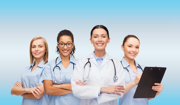 medicine and healthcare concept - team or group of female doctors and nurses