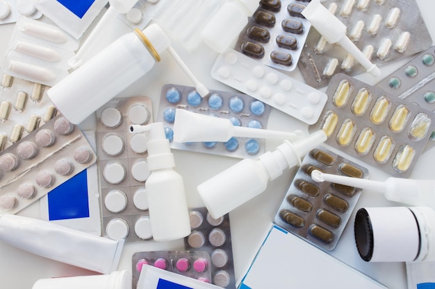 medicine healthcare and pharmacy concept packs of different pills and drugs