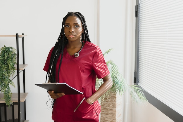 Medicine, people and healthcare concept African American female doctor