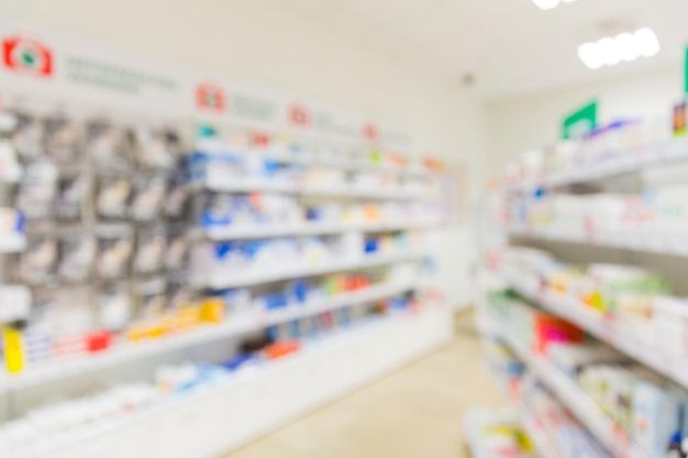 medicine, pharmacy, health care and pharmacology concept - pharmacy or drugstore room blurred background