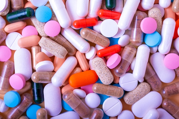 Foto pillole medicinali e capsule sfondo vista dall'alto