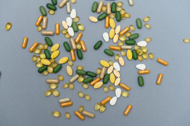 Medicine pills on a grey background