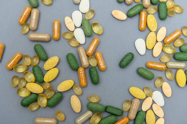 Medicine pills on a grey background