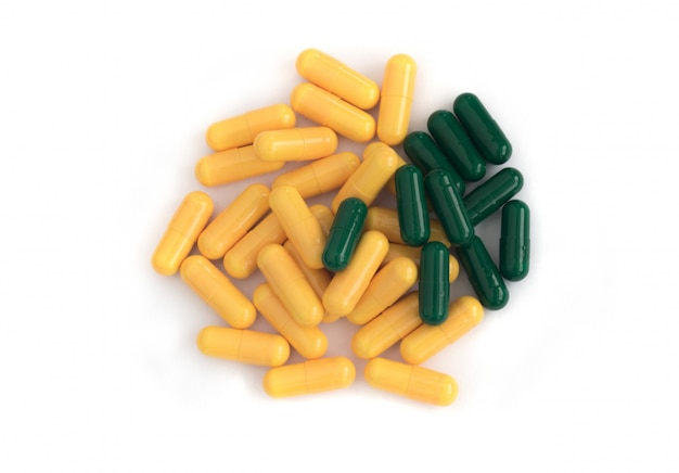 Foto pillole della medicina su superficie bianca