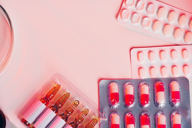 Medicine pills on white table for medical concept