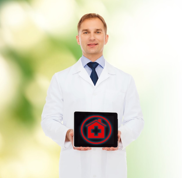 medicine, profession, environment and healthcare concept - smiling male doctor with tablet pc computer over natural background