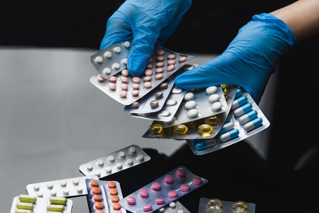 Medicine tablets on the table in the group