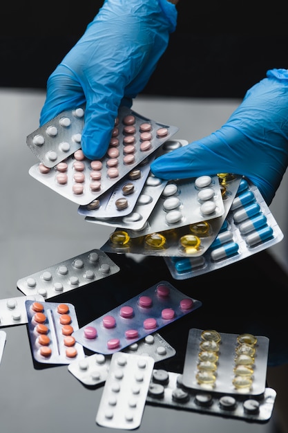 Medicine tablets on the table in the group