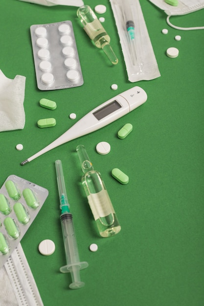 Medicines on a green background