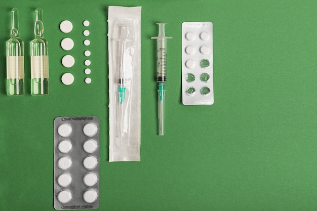 Medicines on a green background